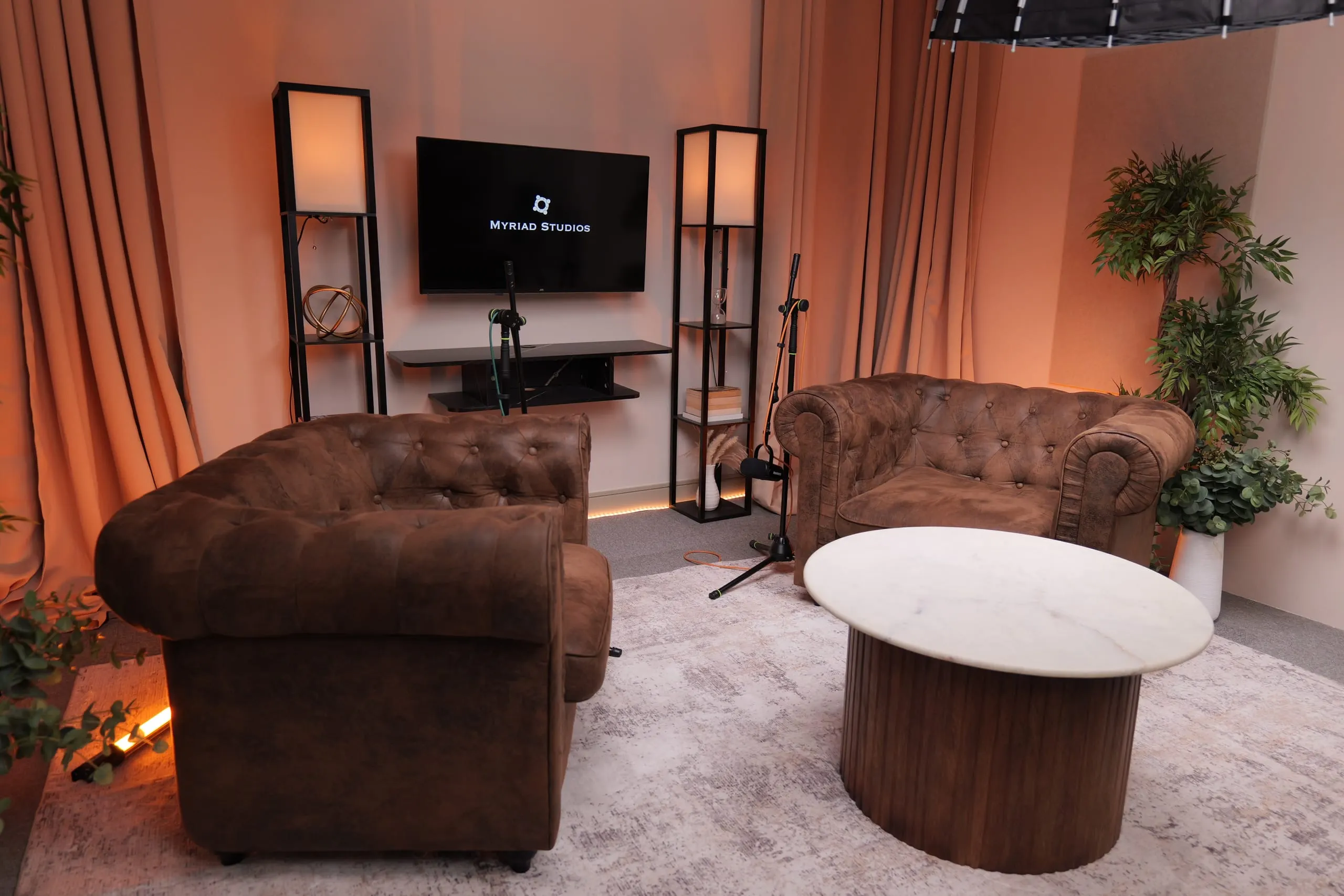 Room 1 (Chesterfields) podcast set at Myriad Studios, view 3 of 8