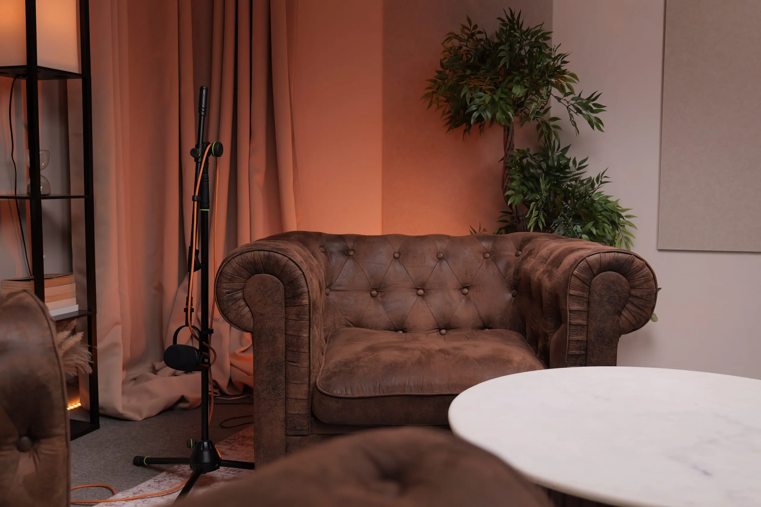 Room 1 (Chesterfields) podcast set at Myriad Studios, view 5 of 8